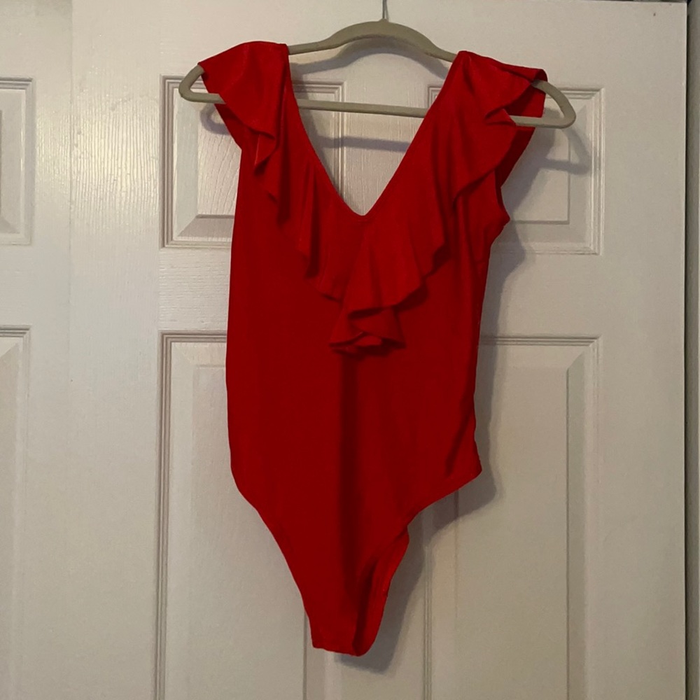 Red bodysuit. Deep V front and tie back